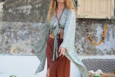 With brown maxi skirt and flat sandals