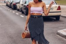 With crop top, straw bag and white sandals