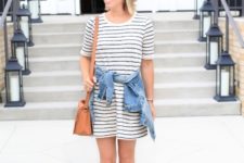With hat, brown bag, denim jacket and striped flat shoes