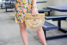 With straw bag and blue platform sandals