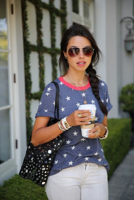 With white pants, embellished bag and sunglasses