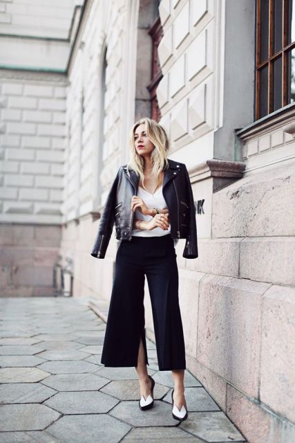 With white top, black leather jacket and black and white heels