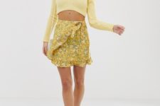 With yellow off the shoulder crop top and lace up flats
