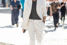 a creamy suit, a graphite grey tee and matching sneakers with no socks for a formal summer look