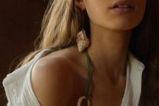 bold statement seashell earrings with seashells hanging down to the shoulder are ideal for beach parties