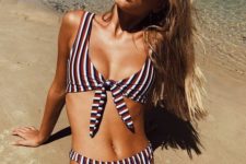 02 a retro-inspired striped bikini with a knot top and a high cut leg bottom