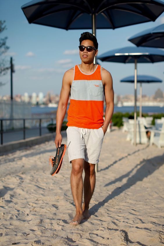 a striped sporty top, matching shorts and sneakers for much comfort at the beach and after it