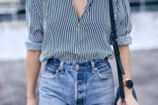06 a black and white striped shirt, denim shorts, a black bag make up a chic and stylish look