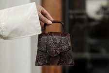 09 a tiny dark snake print bag will be a nice accessory for a party or even a more formal occasion