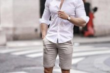 12 a stylish outfit with grey shorts, a white button up, white sneakers for a simple and comfy look