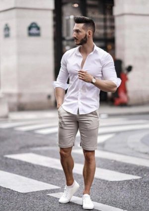 Picture Of a stylish outfit with grey shorts, a white button up, white ...
