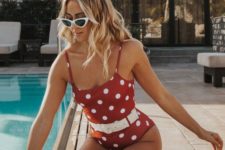 13 a retro red and white polka dot one piece with a white belt is pure retro elegance