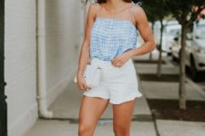 With checked top, white clutch and beige high heels