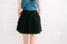 With crossbody bag, brown flat shoes and black skater skirt