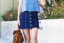 With denim mini skirt, brown mini backpack and sandals