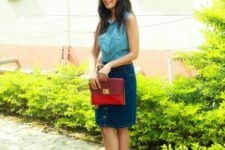 With denim pencil skirt, red clutch and red lace up sandals