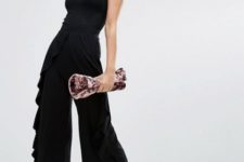 With halter top, printed clutch and black shoes