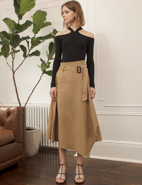 With light brown midi skirt and lace up shoes