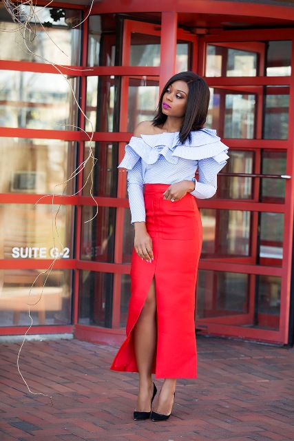 With red high-waisted slit maxi skirt and black pumps