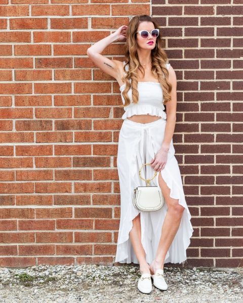 With ruffled top, white bag and white mules
