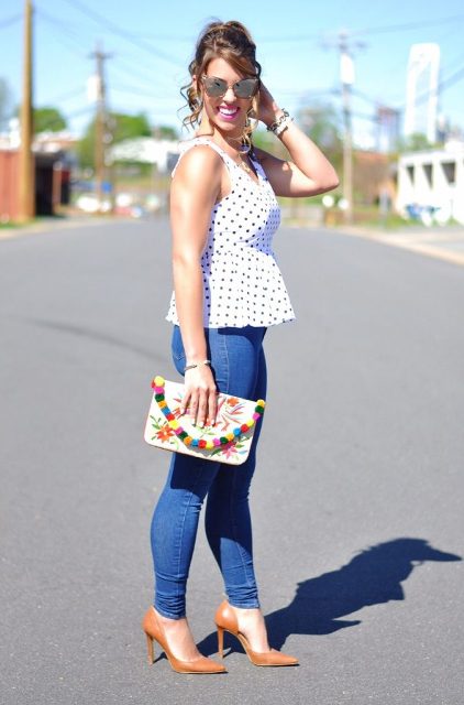 With skinny jeans, printed clutch and orange pumps
