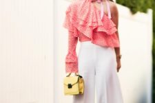 With white culottes, yellow mini bag and pink shoes