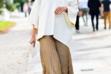 With white loose shirt and printed platform shoes