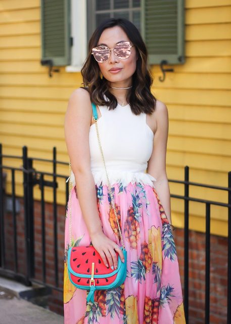 With white top and fruit printed skirt