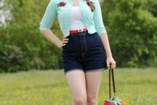 With white top, mint green crop jacket, denim shorts and white shoes
