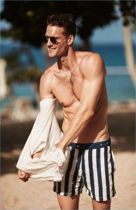 vertical stripe navy and white trunks show that effortless French chic that is so hot this year