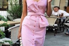03 a pink and white striped fitting dress with a button row and a geometric cut looks retro and feminine