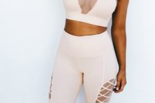 04 a sexy blush set with an illusion neckline sleeveless top, cutout leggings and white trainers