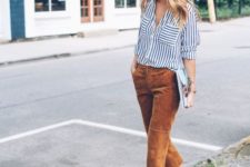 08 a striped black and white shirt, rust-colored cropped pants and matching shoes plus a clutch
