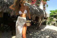 11 a white lace maxi skirt with a super high slit is semi sheer, which makes it sexy