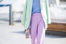 15 a pastel look with lavenderpants, green shoes, a blue crochet top, an oversized light grene blazer and a colorful bag