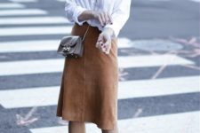 15 a white shirt, a camel suede skirt, creamy shoes and a small brown bag