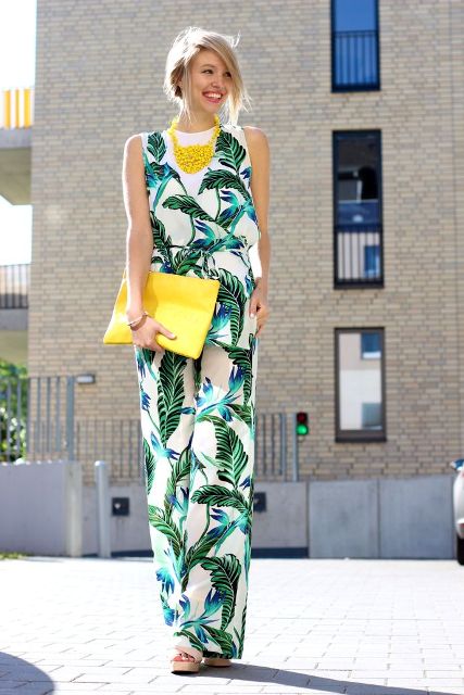 With white top, yellow necklace, platform sandals and yellow clutch
