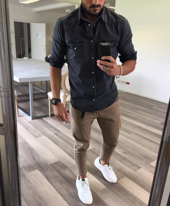 a dark chambray shirt, camel cargo pants, white sneakers for a simple and casual transitional look