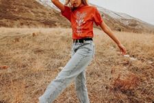 a red printed tee, bleached jeans, checked slipons for a stylish summer look with a 90s touch
