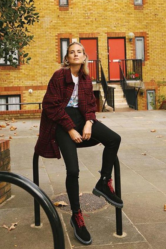 black skinnies, a printed tee, a plaid coat and black suedde platform boots with red laces