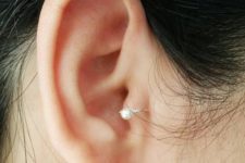 03 a shiny pearl hoop earrings in the tragus is a stylish idea – no other piercings here