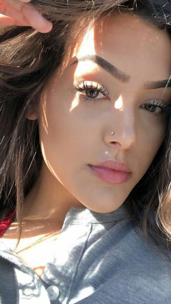 a simple stud nose piercing looks casual and chic and adds a touch of bling to your face