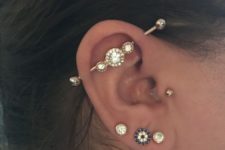 04 multiple bright and shiny piercings plus a matching industrial to make an impression