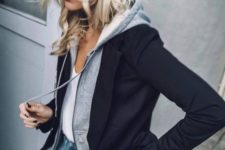 05 blue ripped jeans, a white top, a grey hoodie and a black blazed over it for a chic casual look
