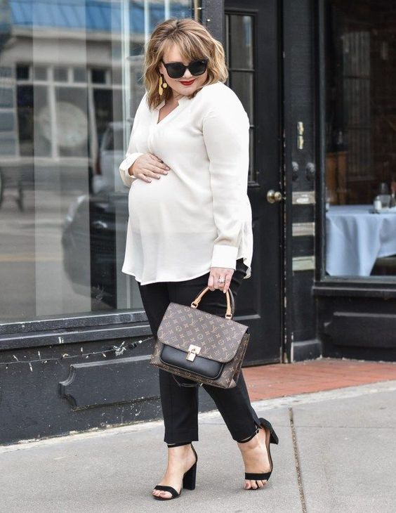 a white shirt, black pants, black block heels and a brown bag are a timeless combo for every work day
