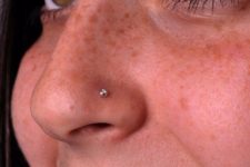 09 a small and shiny piercing will fit most of noses and you may also add color to your look