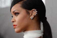 11 Rihanna wearing several ear piercings for a bold and statement look