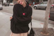 15 an oversized black hoodie, a blush pleated mini skirt and a black bag for every day