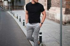 15 grey pants, a black fitting tee, black sneakers and no socks make up a comfy weekend look