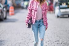 With pale pink t-shirt, ruffled jacket, distressed jeans and clutch